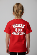 6-year-old girl in red shirt with Pizazz design on back