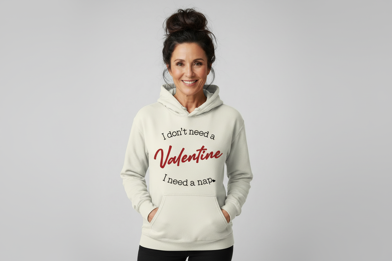Mature woman in cream hoodie with Valentine design