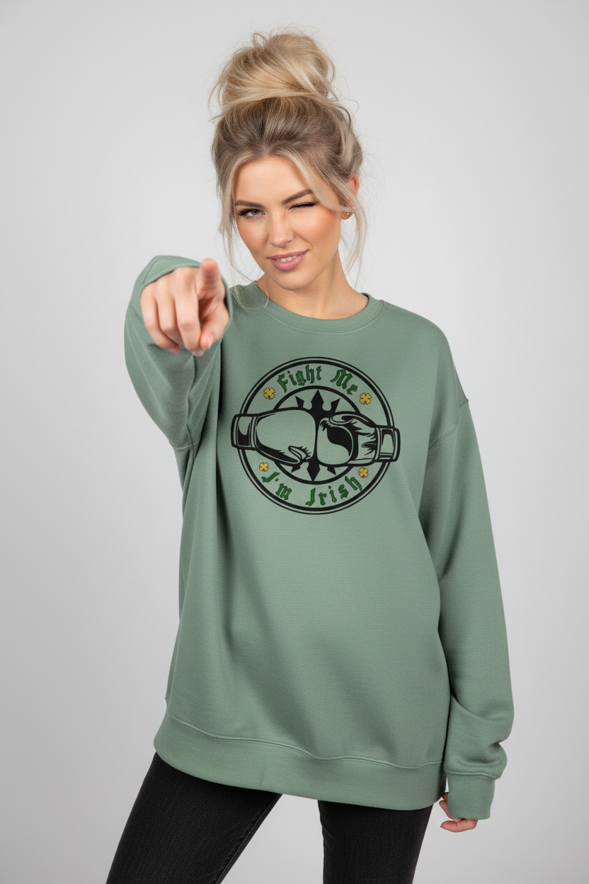 Sage oversized sweatshirt - blonde woman with large bun winking - pointing at camera