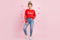 Woman with big messy bun in love sweatshirt
